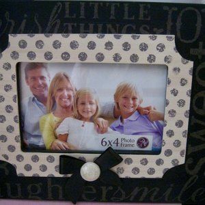 "NEW FRAME FOR FAMILY PHOTOS AND OTHER KEEPSAKES" NEVER USED OR DISPLAYED
